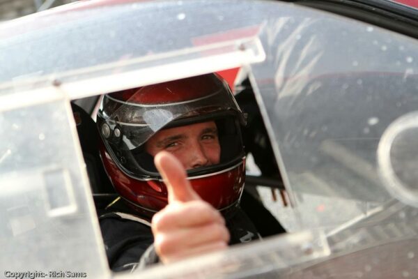 vince noott driver helmet red thumbs up source my car, car sourcing in the uk